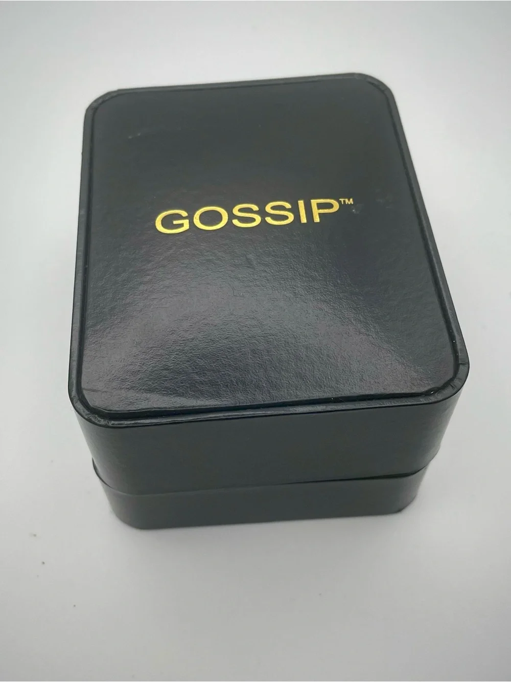 Gossip Gold-Tone Black and Champagne Crystal Bangle Watch. In original box.